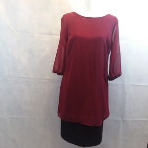 Red blouse  bow in back